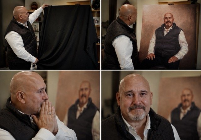 A customer unveiling their hand-painted oil portrait